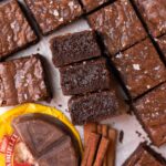 brownies laying on the side showing the fudgy center.