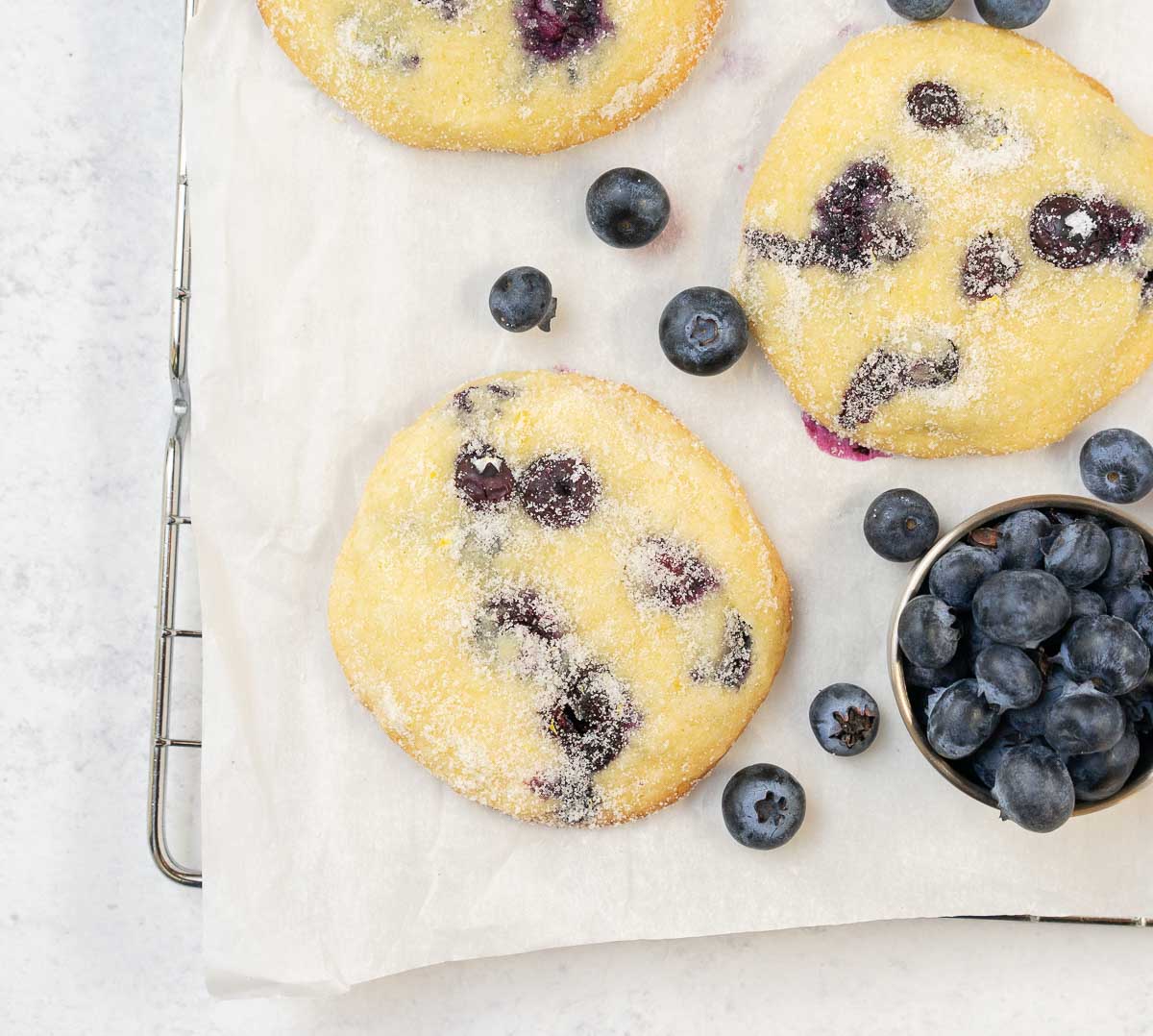 lemon blueberry cookies on a baking sheet.