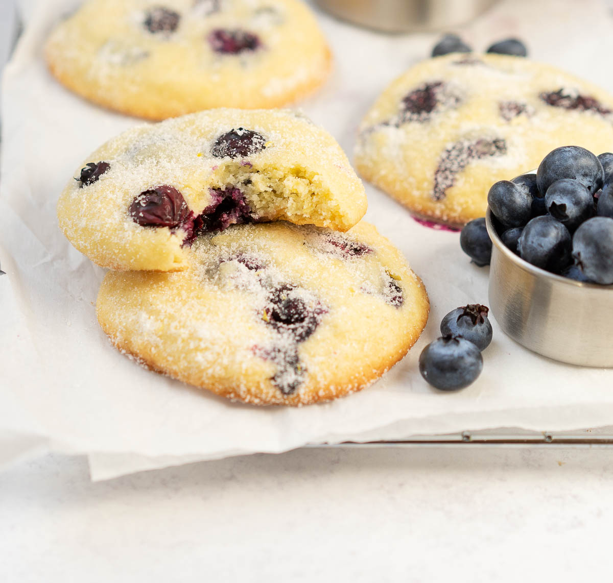 lemon blueberry cookies on a baking sheet.