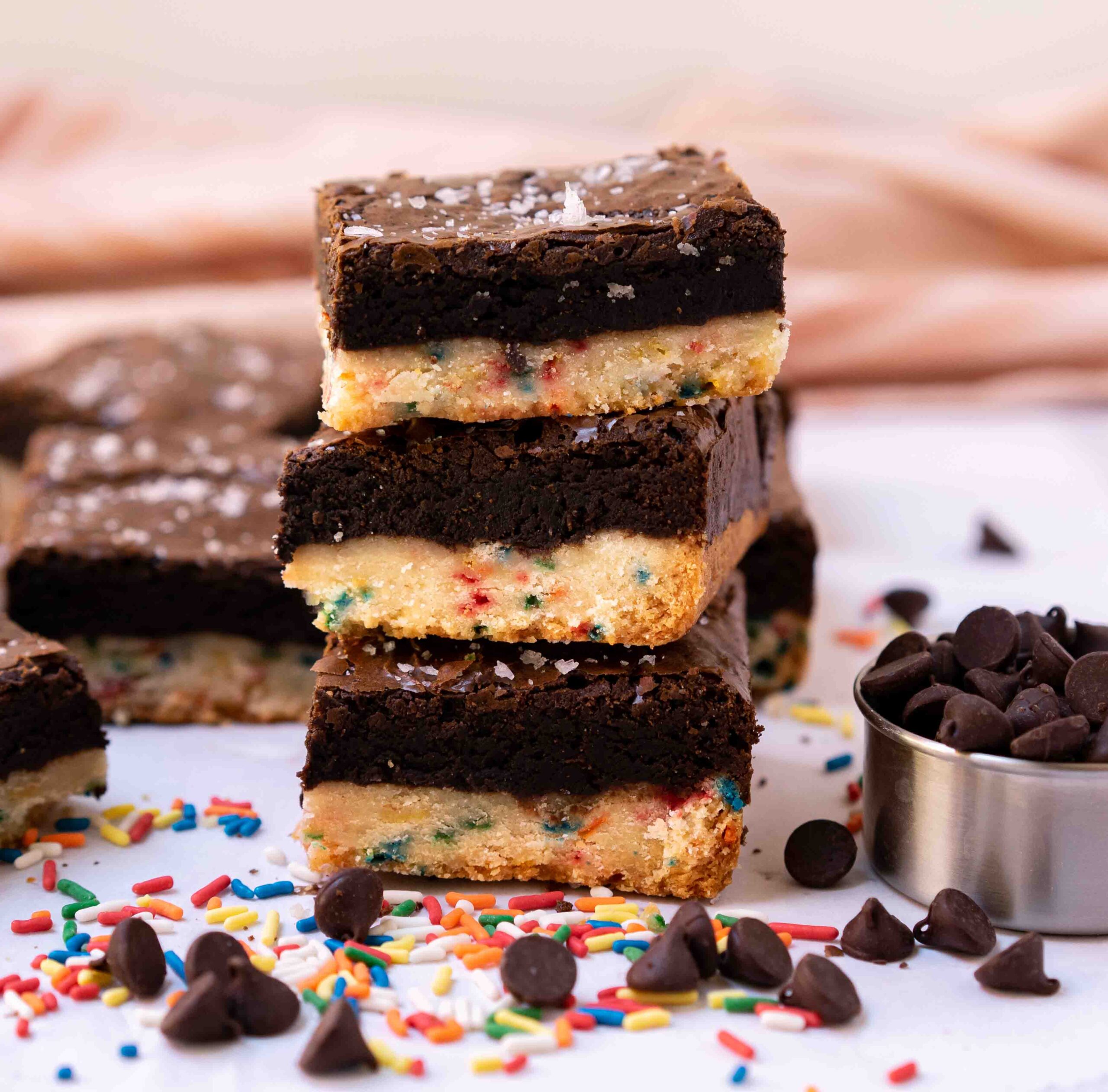 birthday brownies stacked on top of one another.