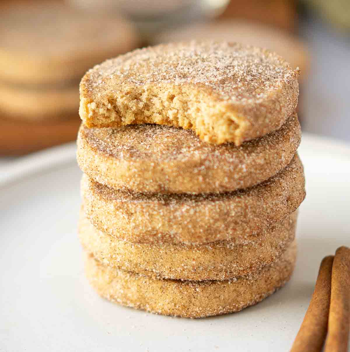 cinnamon shortbread cookie with bite in it.