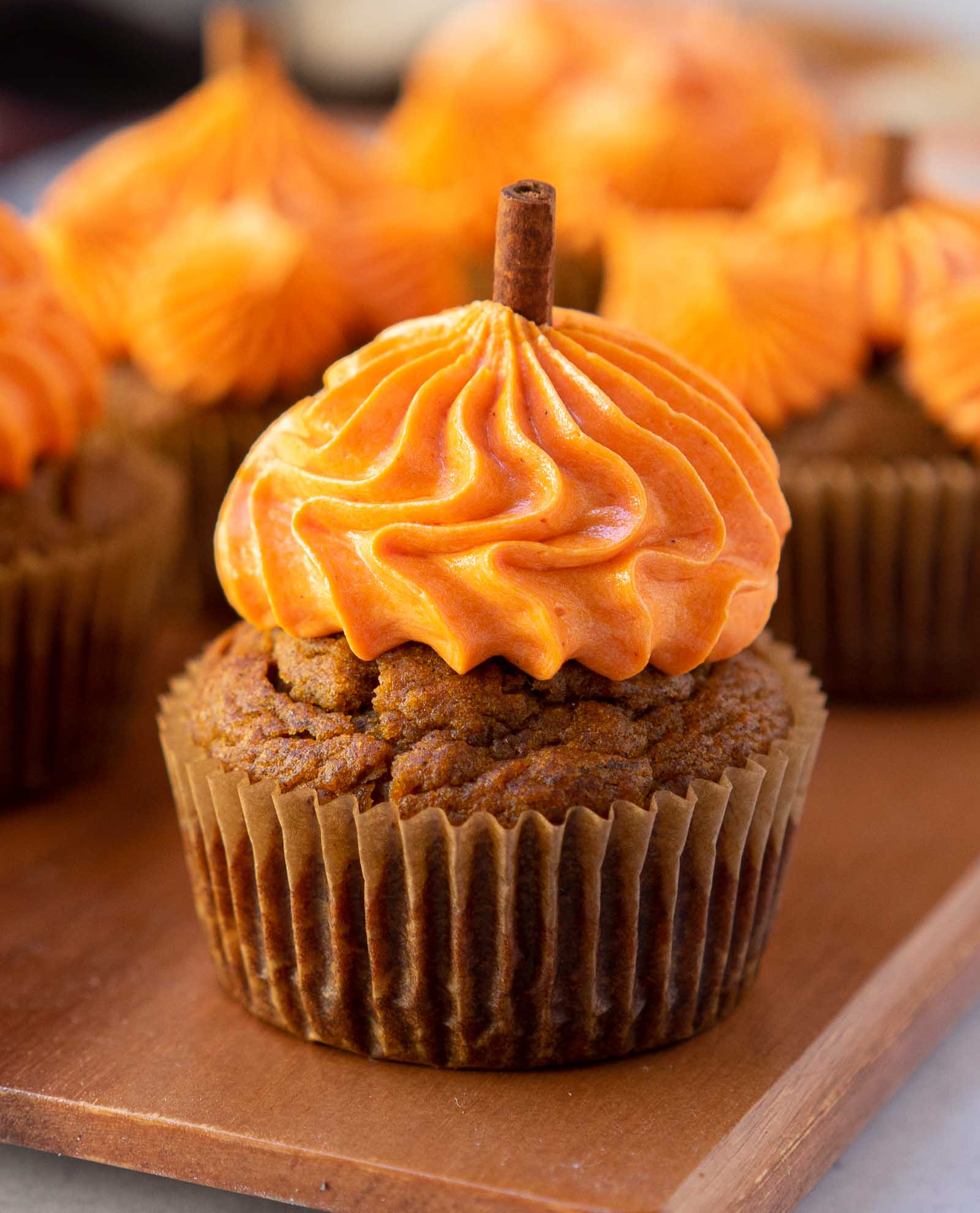 banana pumpkin muffins with vanilla buttercream frosting.