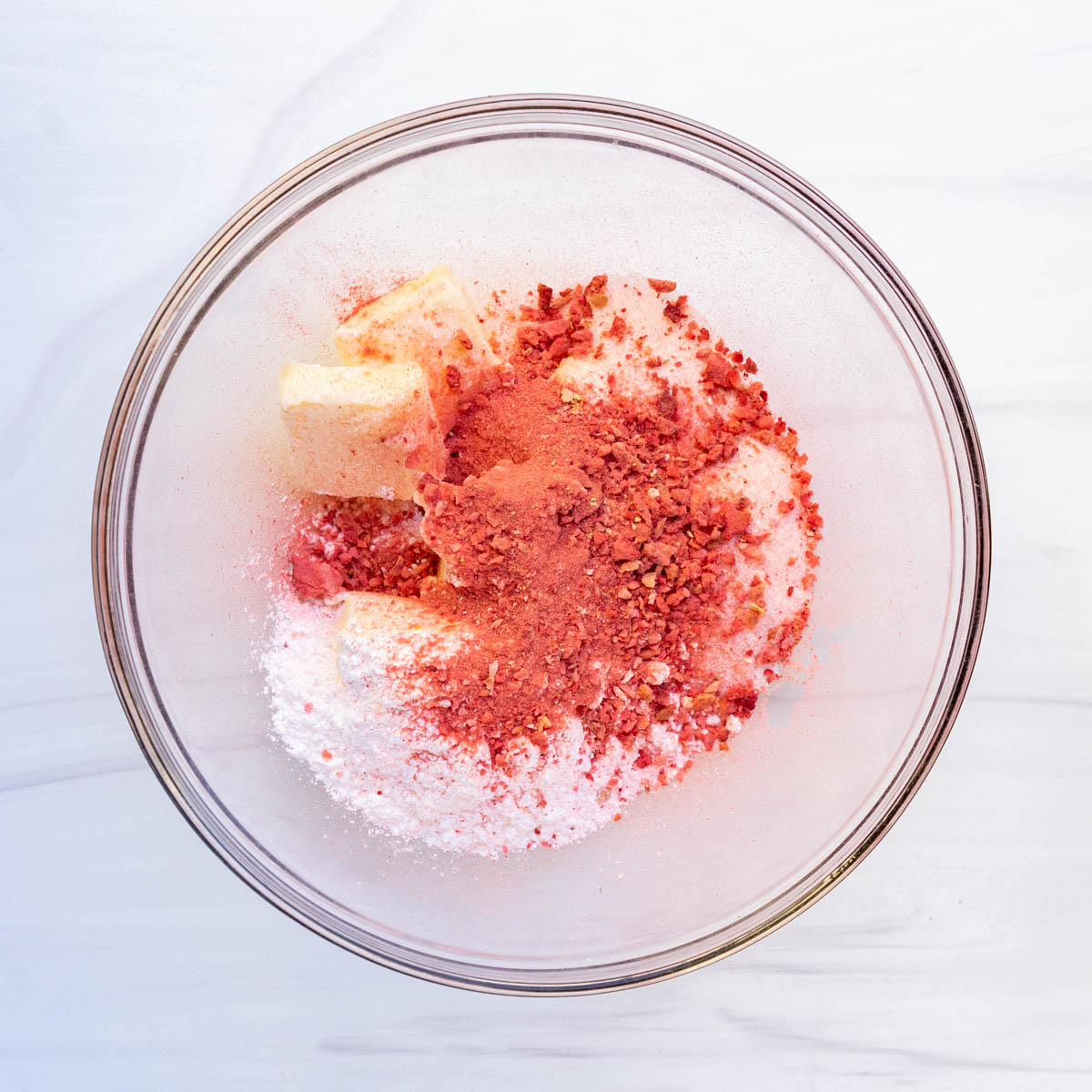 ingredients to make strawberry sugar cookies in bowl.