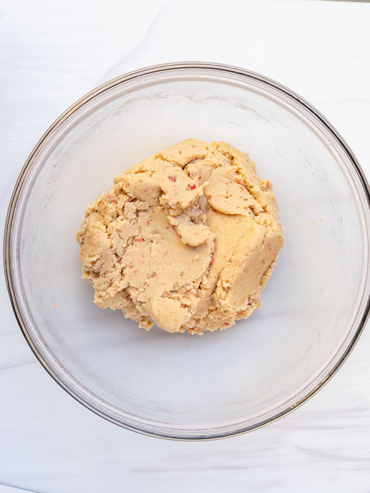 strawberry sugar cookie dough in mixing bowl.