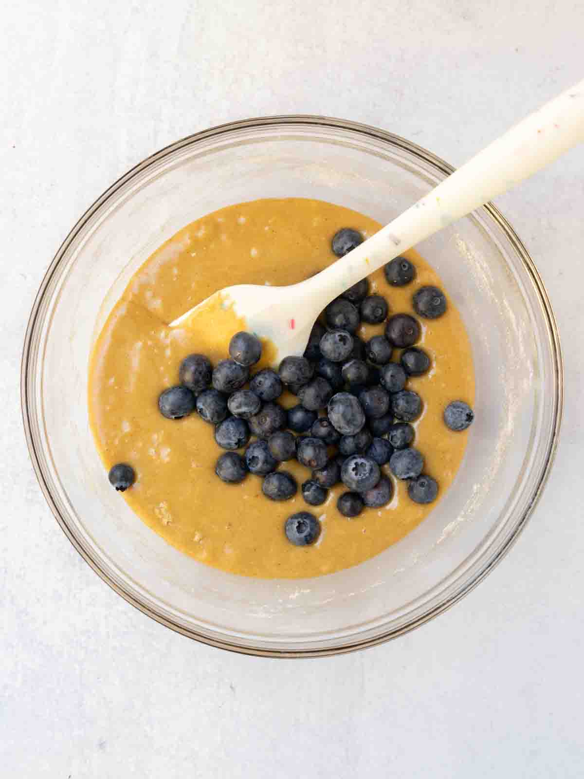 fresh blueberries added to blondie batter.