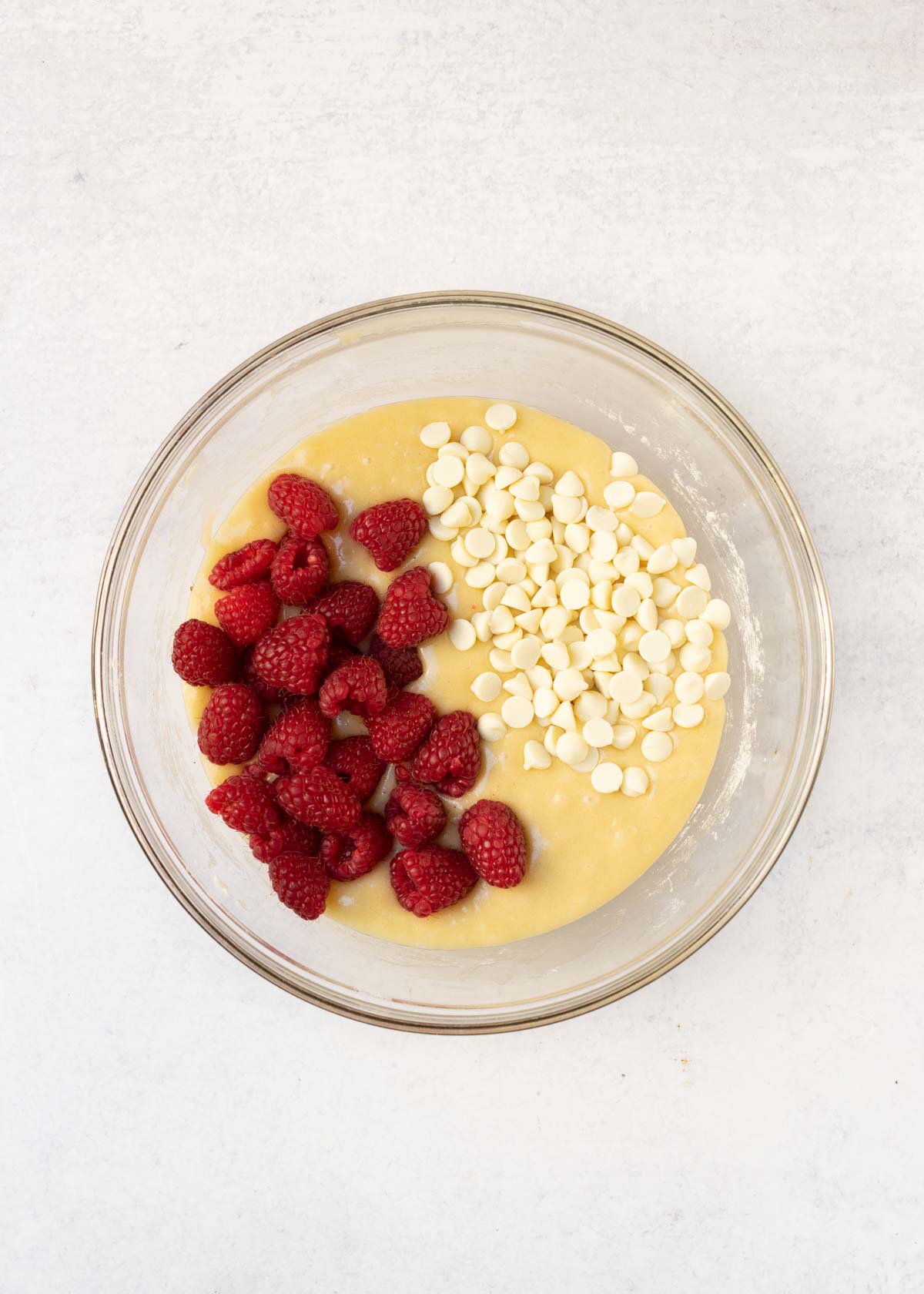 Raspberries and white chocolate chips added to batter.