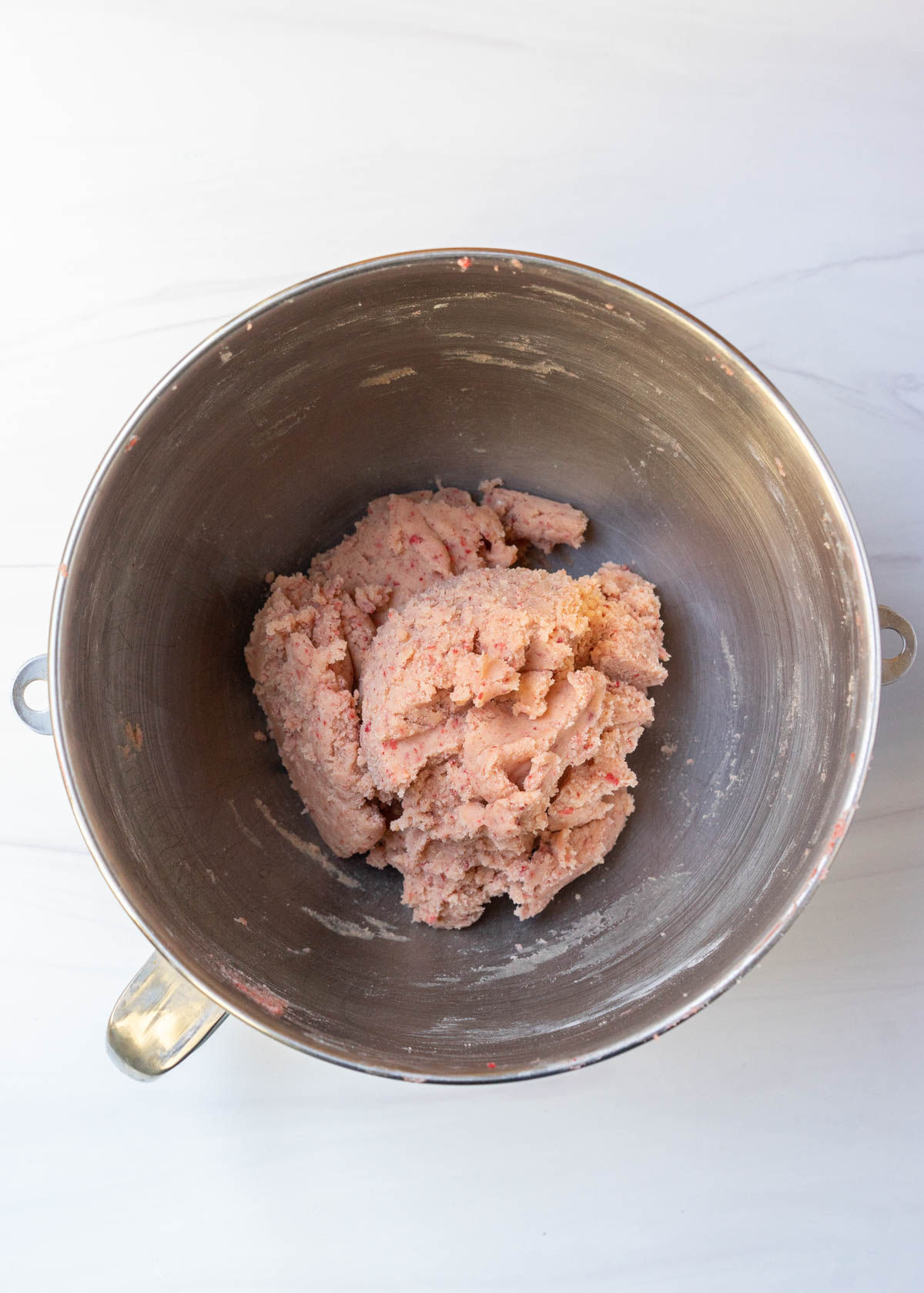 strawberry sugar cookie dough in bowl.