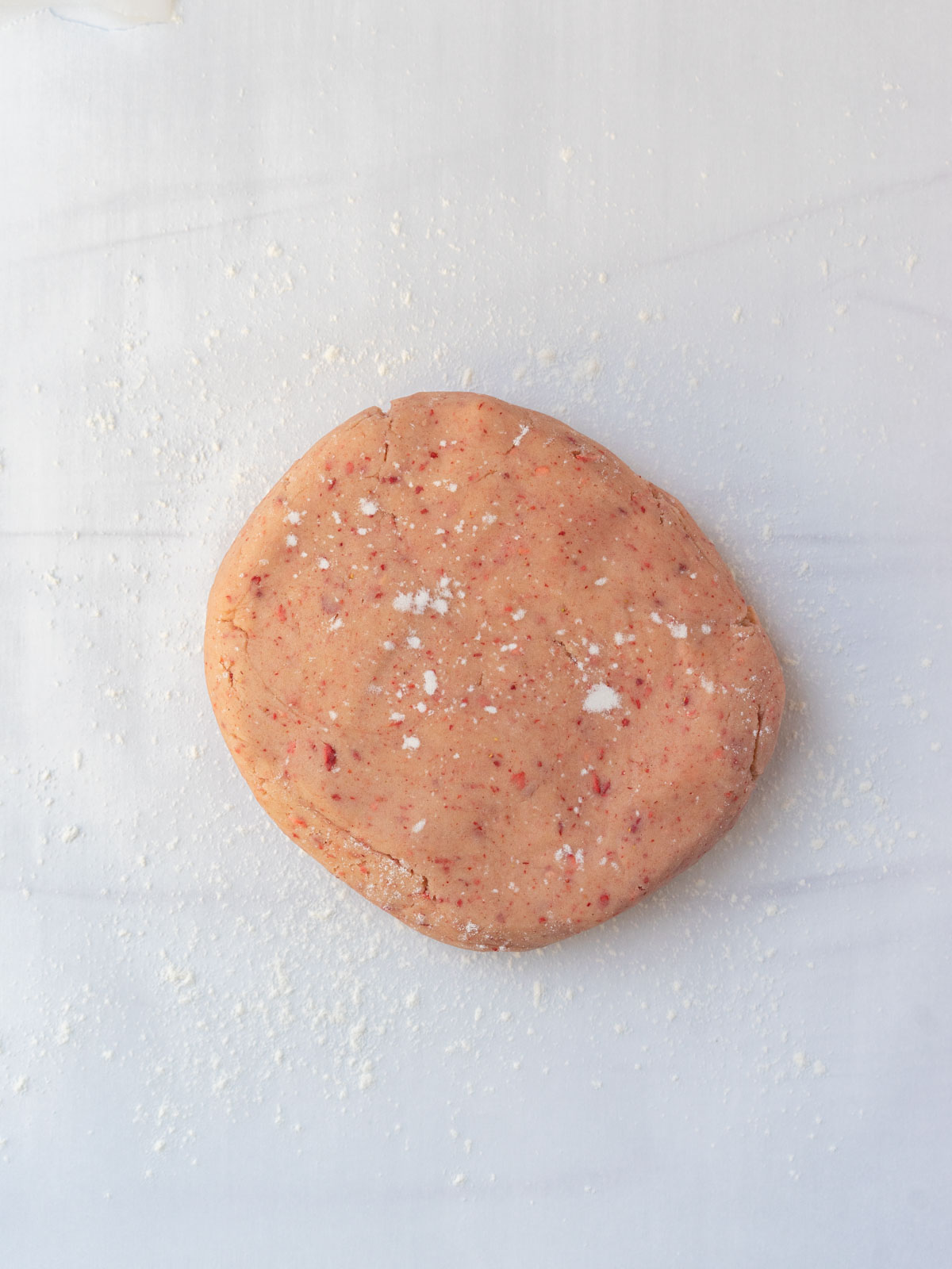 strawberry sugar cookie dough dusted with flour.