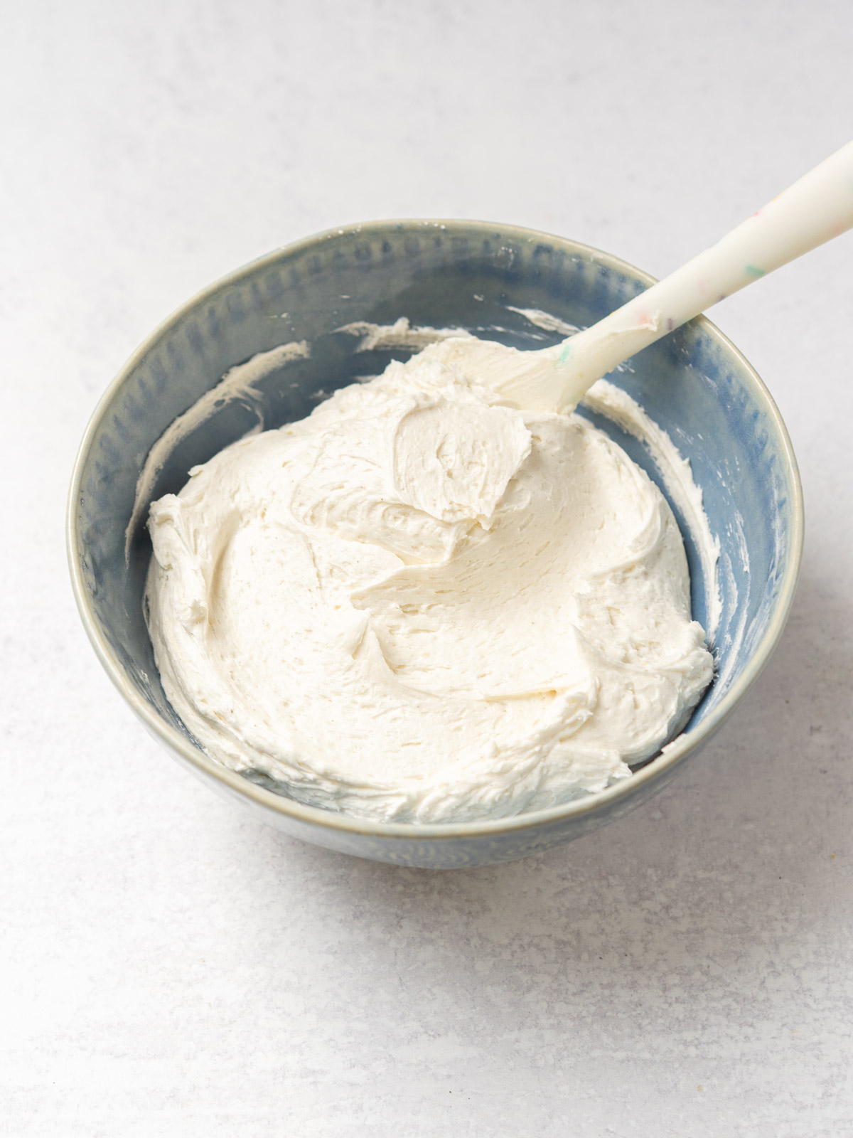 vanilla American buttercream frosting in bowl.