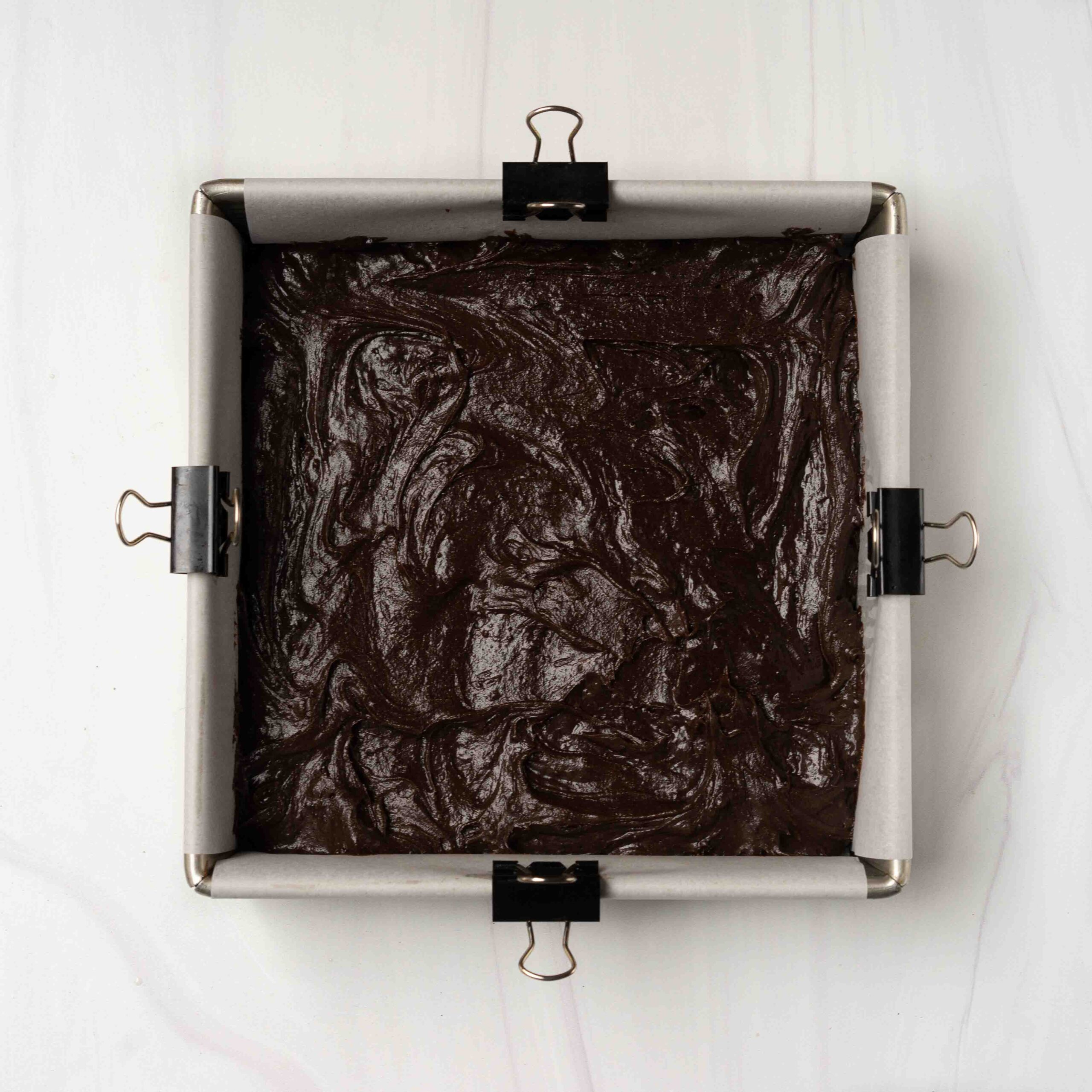 Espresso brownie batter in baking pan.