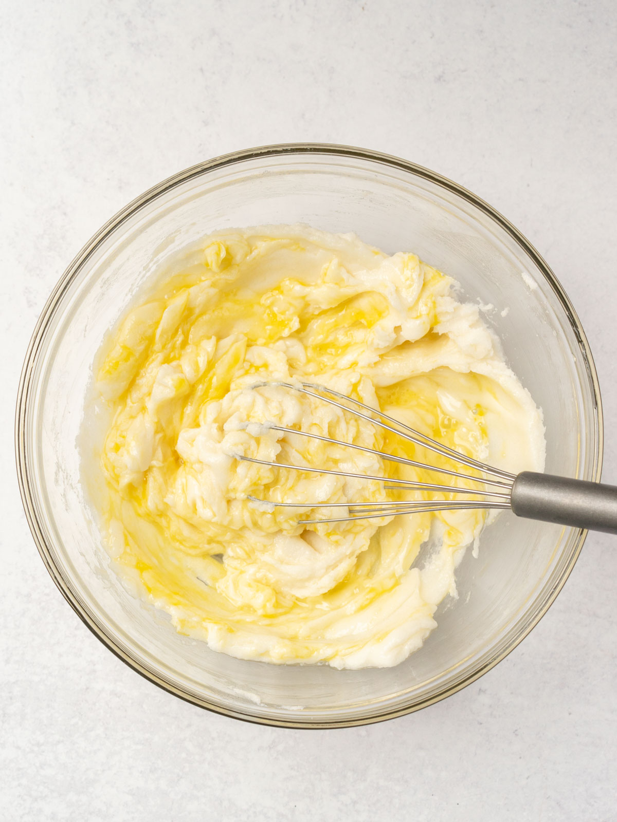 whisking egg into mixture.