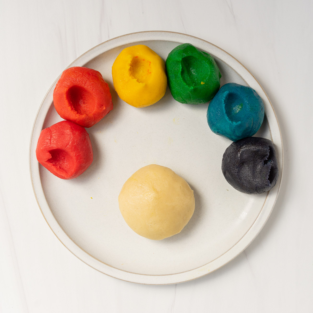 rainbow butter cookie dough on bowl.